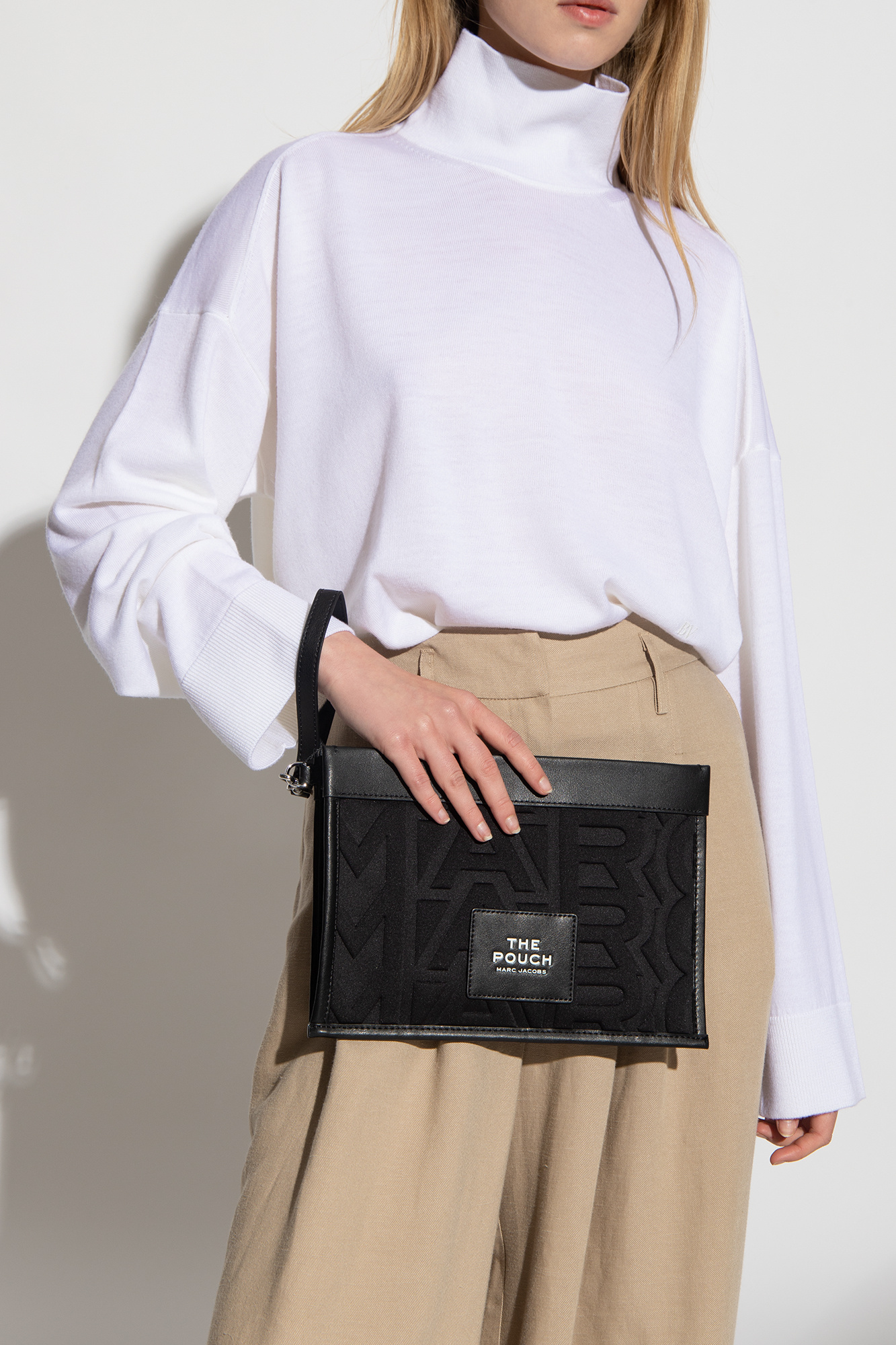 The pouch by Marc Jacobs offers